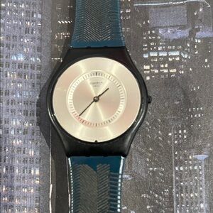 VINTAGE SKIN WATCH , thin, good cond, petrol energy watch , silicone band